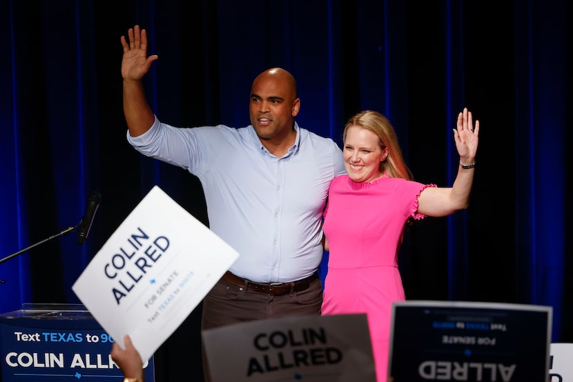 Senate candidate Colin Allred and his wife Alexandra Eber waves as they exit the stage after...