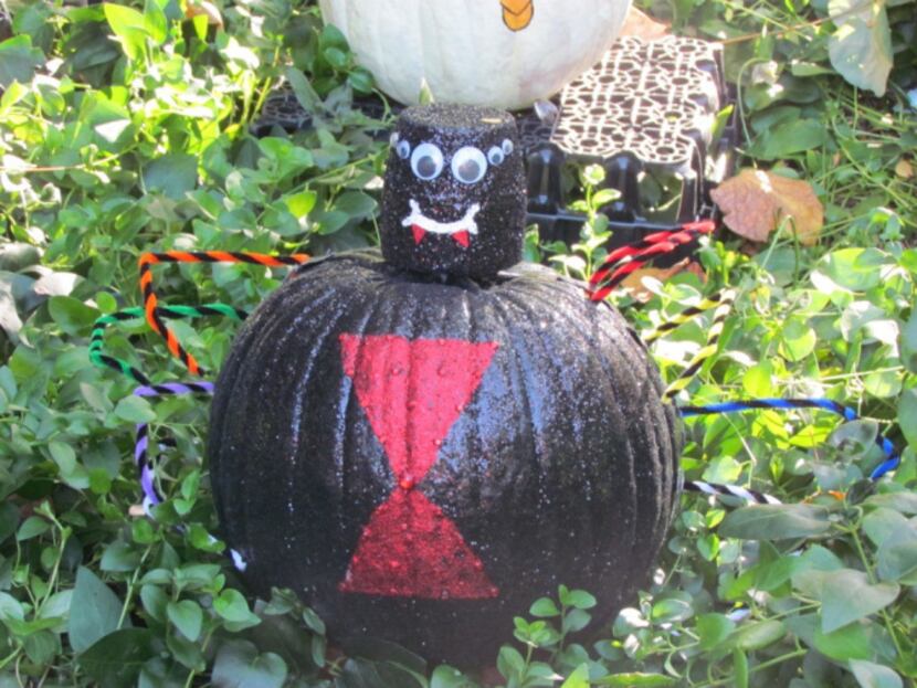 Come see pumpkins painted as all kinds of things, such as this black widow spider, at the...