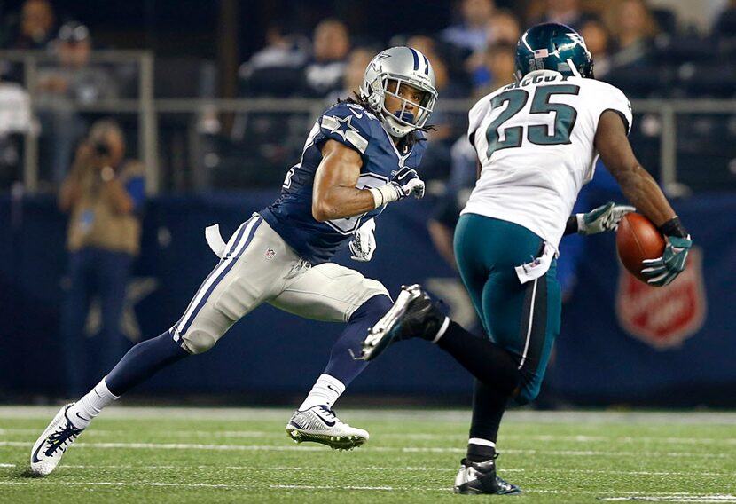 Dallas Cowboys cornerback Orlando Scandrick (32) can't make a diving tackle of Philadelphia...