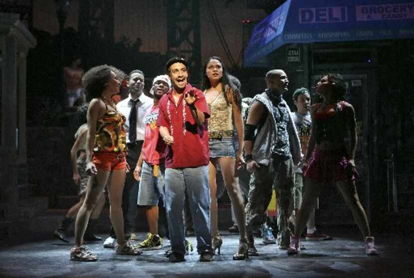 Lin-Manuel Miranda (center) as Uanavi in the musical In the Heights at the Richard Rodgers...