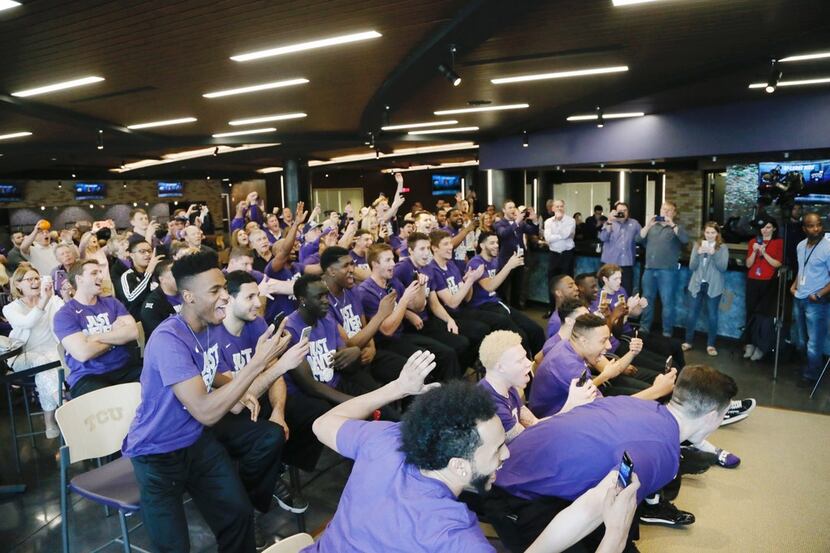 The TCU Men's basketball team and fans react after they are selected to the NCAA basketball...