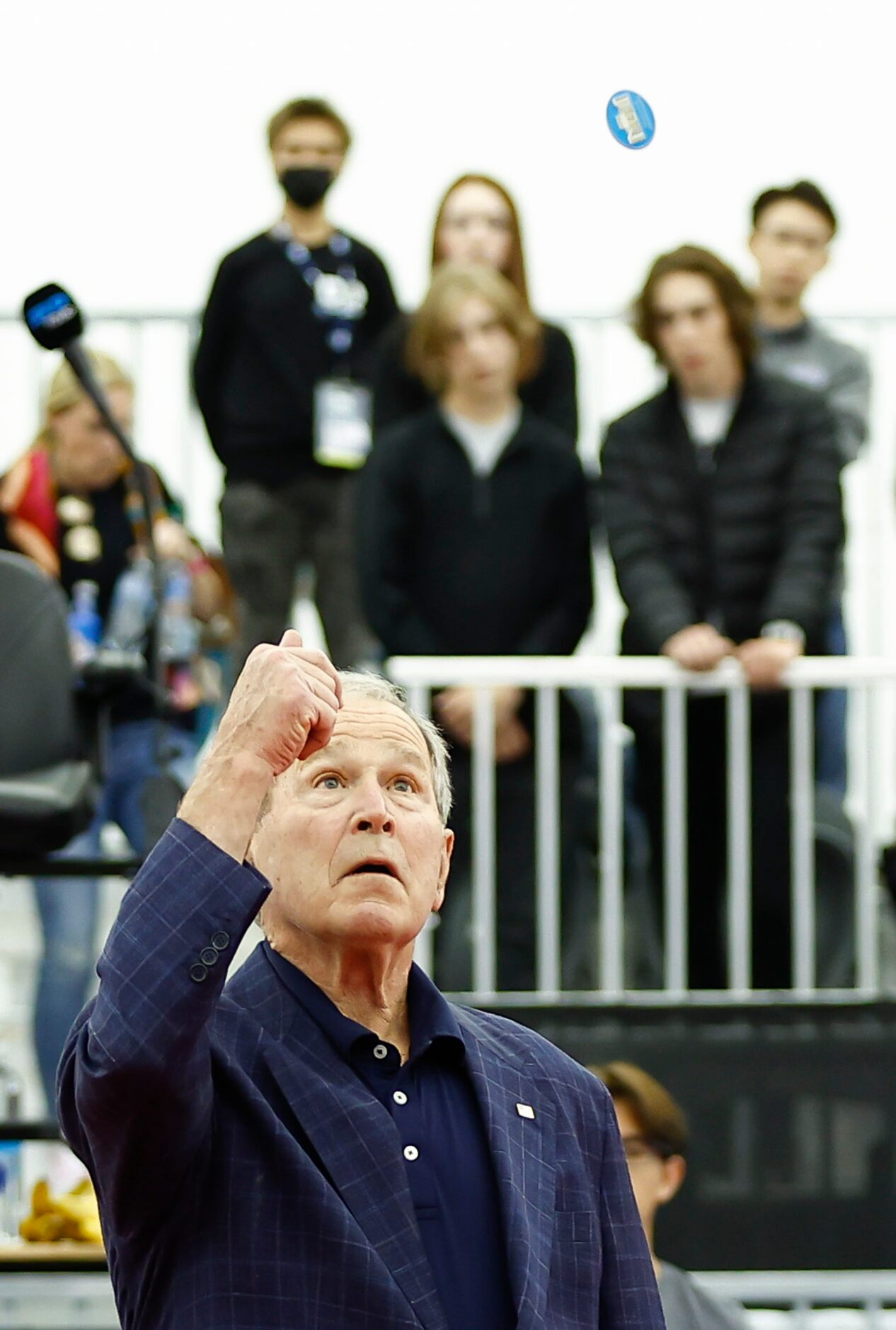 Former President George W. Bush tosses a coin before the start of the finals ATP Dallas Open...