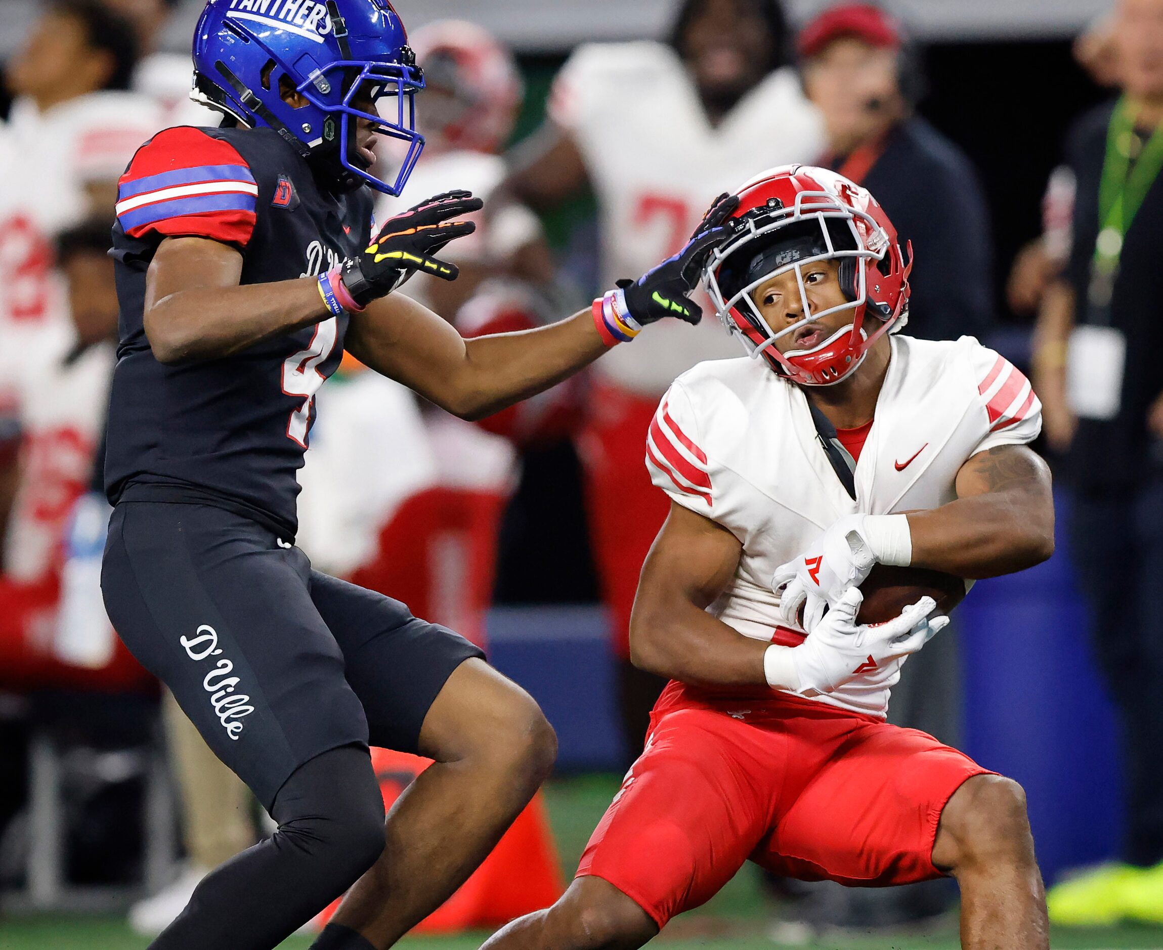 Duncanville receiver Dakorian Moore (4) attempts to tackle Galena Park North Shore defensive...