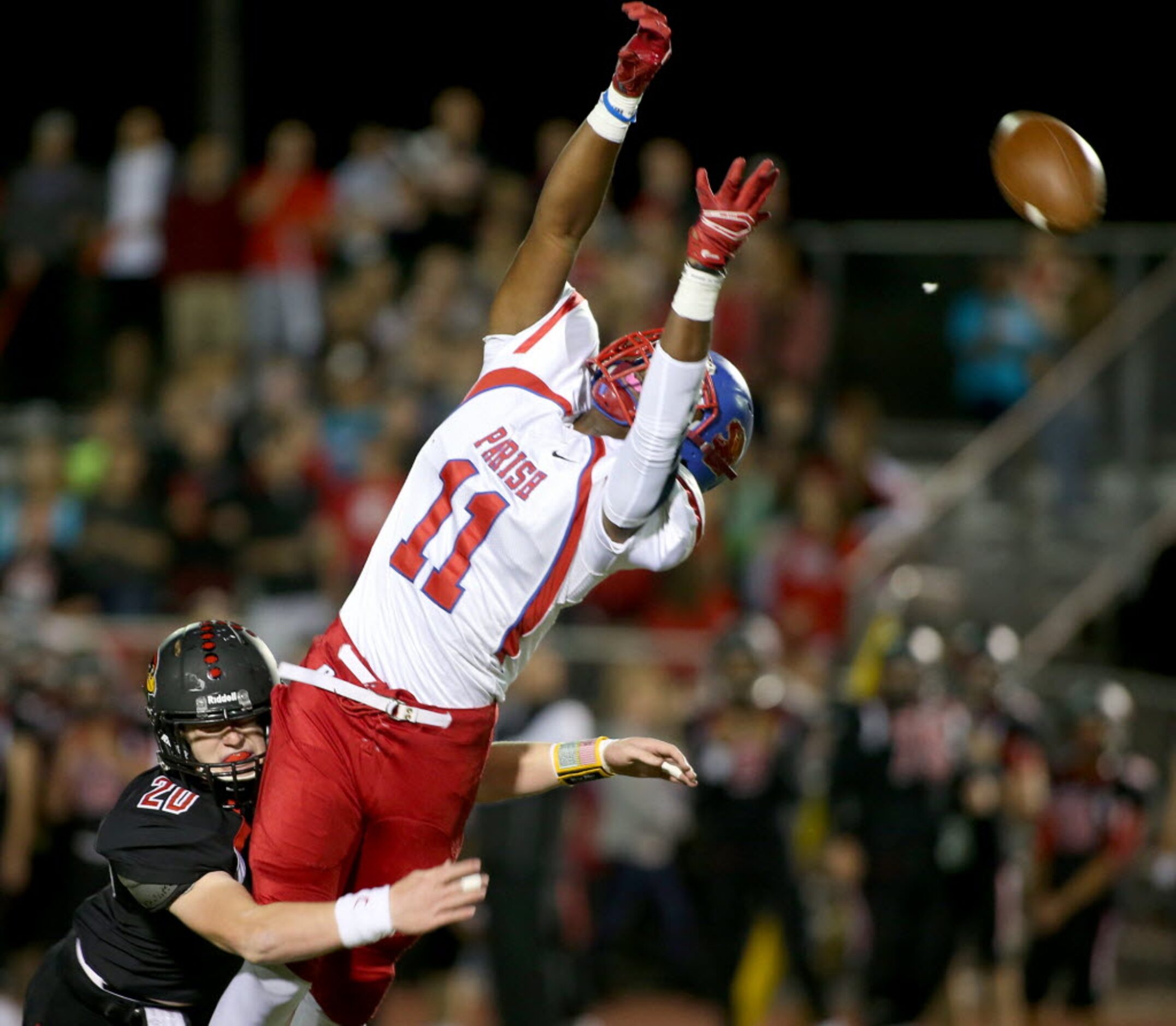 Parish Episcopal’s Justin Morris (11) is pressured by Fort Worth Christian’s Conner Worsham...