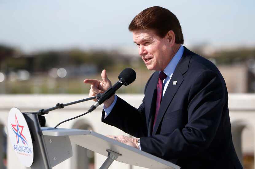 Arlington Mayor Jeff Williams speaks during a ribbon cutting for the new Center Street...