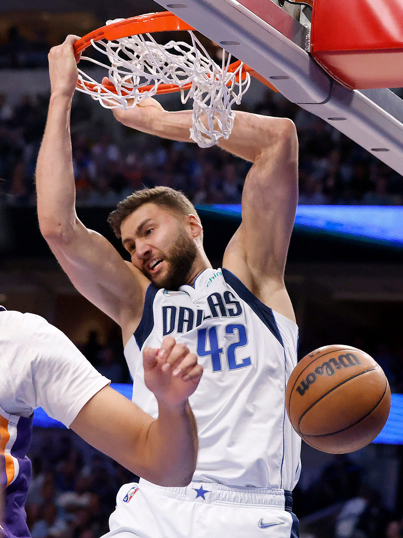 Dallas Mavericks forward Maxi Kleber (42) dunks the bal against the Phoenix Suns during the...