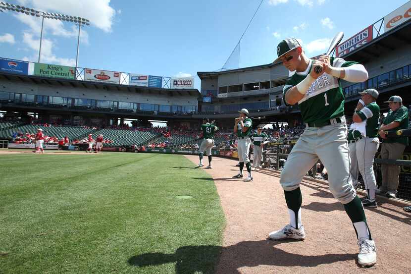 FILE - Prosper's Steele Walker(1) warms up during the UIL State Baseball 5A semifinal in...