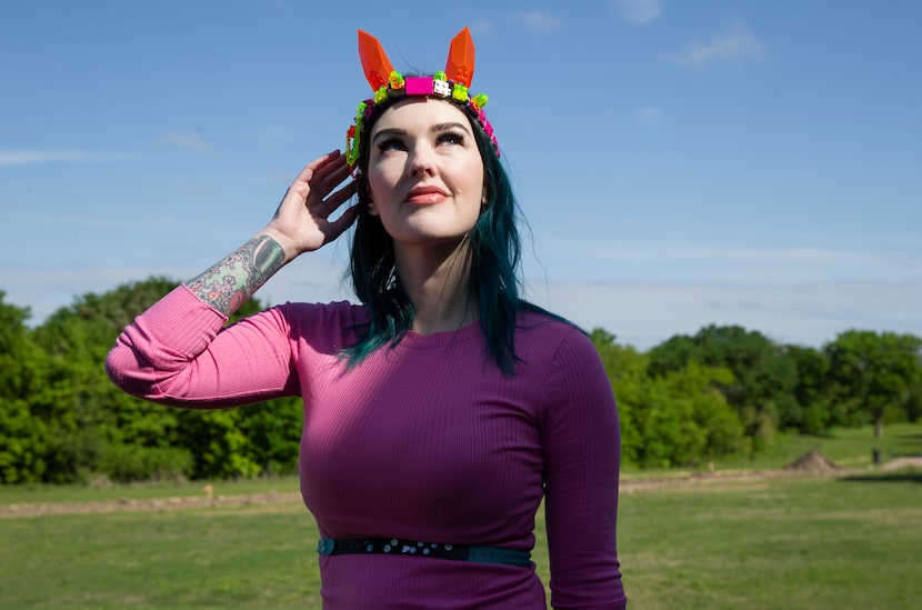 Amie Dansby wears a Lego cat ears hairband and a belt she made herself. The Dallas area...