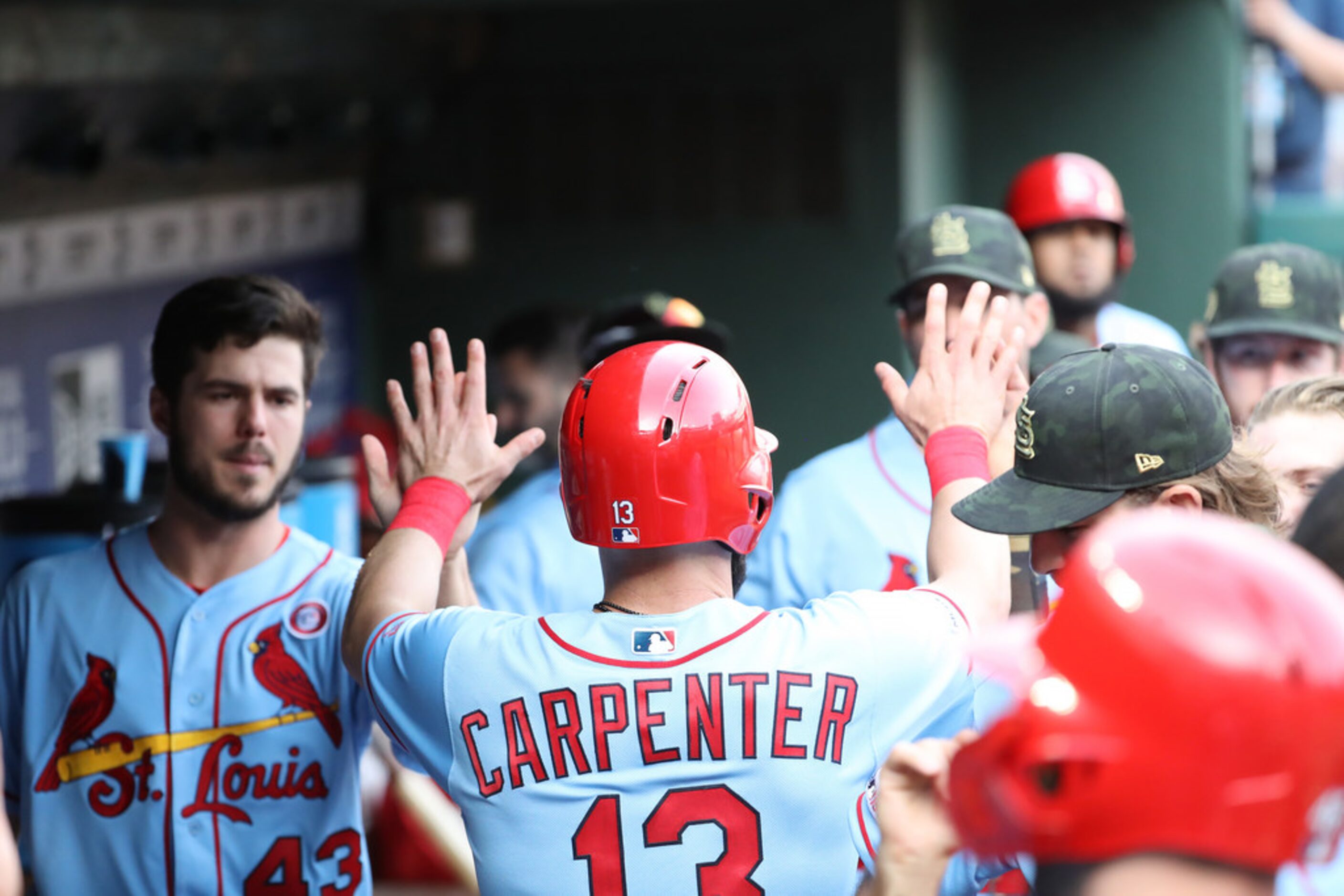 ARLINGTON, TEXAS - MAY 18:  Matt Carpenter #13 of the St. Louis Cardinals celebrates a run...