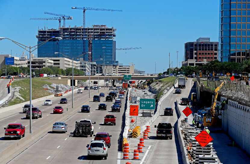 Traffic on the Dallas North Tollway passes the Legacy Drive exit at the Legacy West...