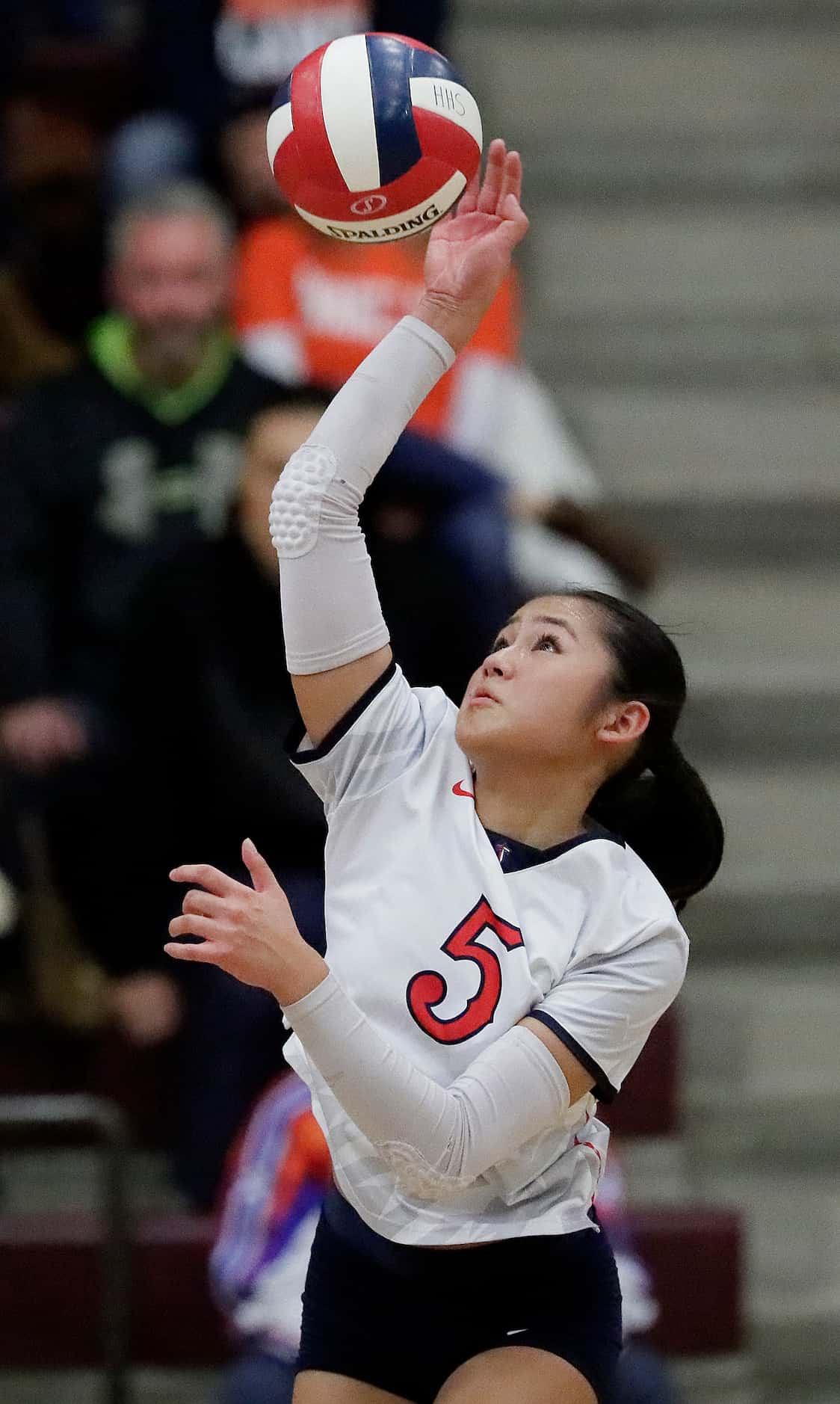 Centennial High School setter Madison Victoriano (5) makes a hit during game two as Wakeland...