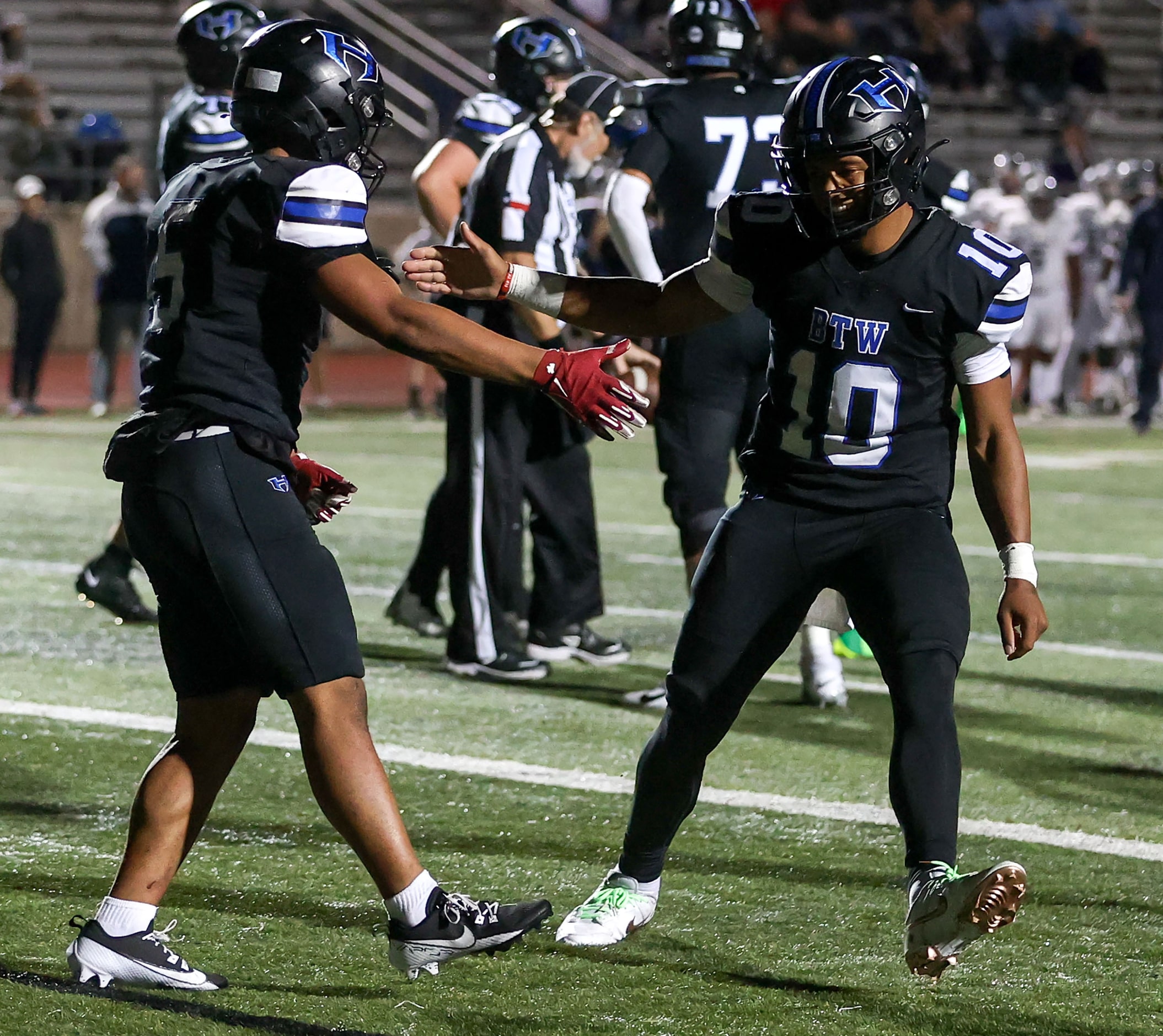 Hebron quarterback Patrick Crayton Jr (10) celebrates with running back Ayson McCray Jones...