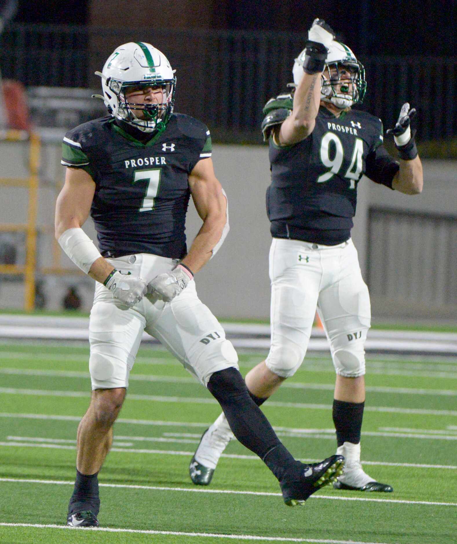 Prosper’s Mason Jolley (7) and James Eckrote (94) celebrate after a defensive stop in the...