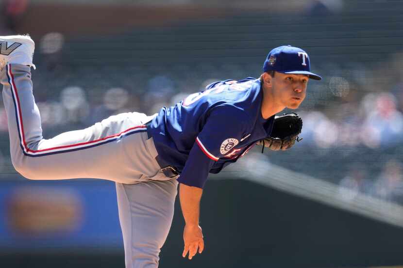Texas Rangers pitcher Jack Leiter throws against the Detroit Tigers in the first inning of a...