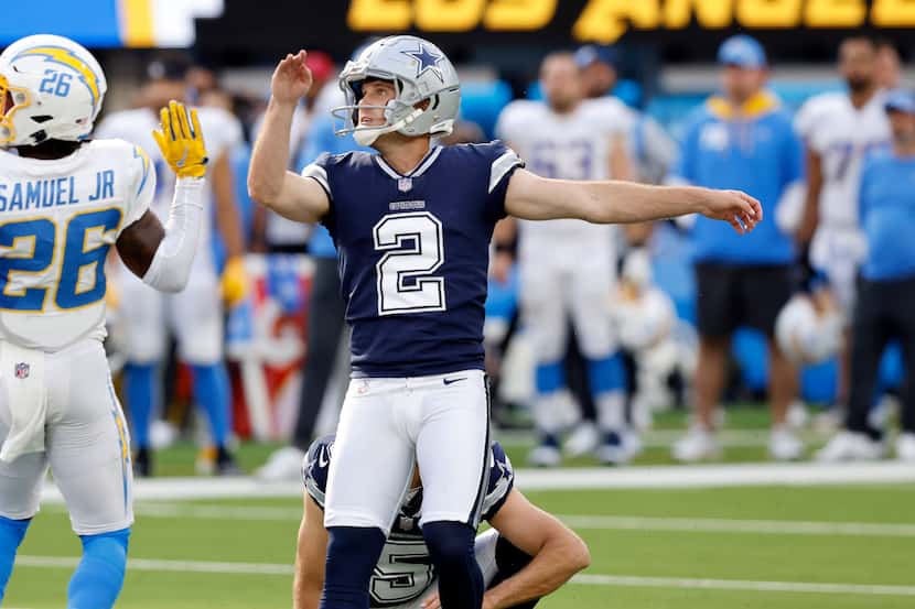 Dallas Cowboys place kicker Greg Zuerlein (2) watches his winning field goal at the end of...