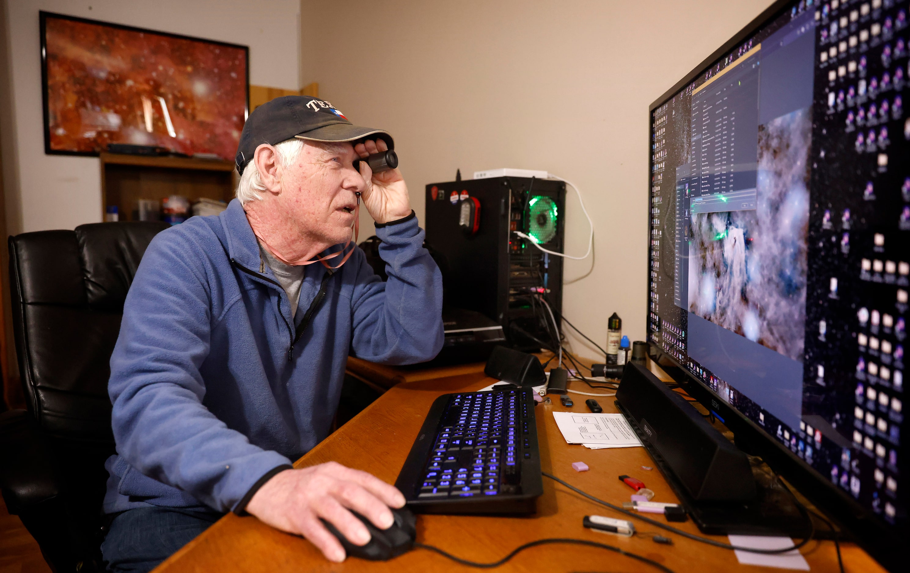 Astrophotographer Peter Armstrong ,78, and is legally blind, uses a monocular to view files...