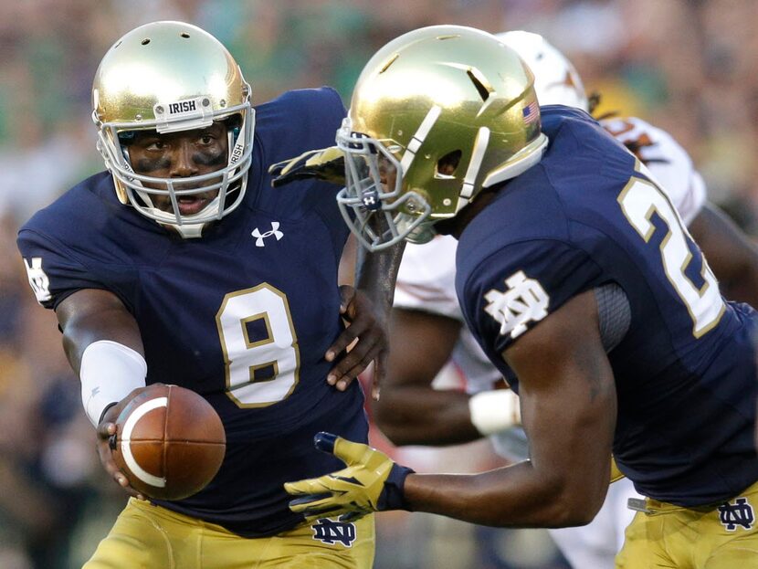 FILE - In this Saturday, Sept. 5, 2015 file photo, Notre Dame quarterback Malik Zaire, left,...