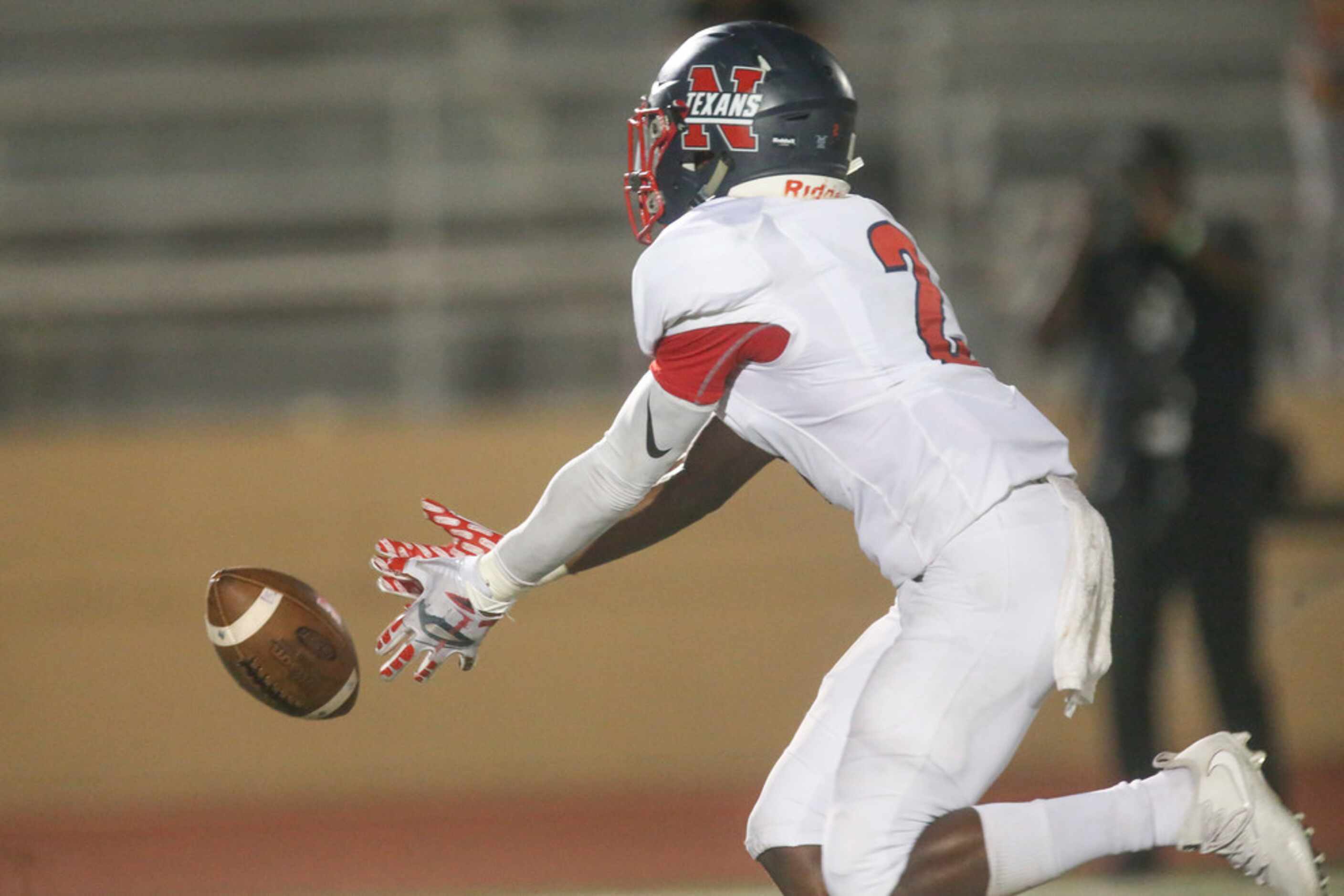 Northwest wide receiver Zavion Taylor (2) bobbles the ball during the second half of a high...