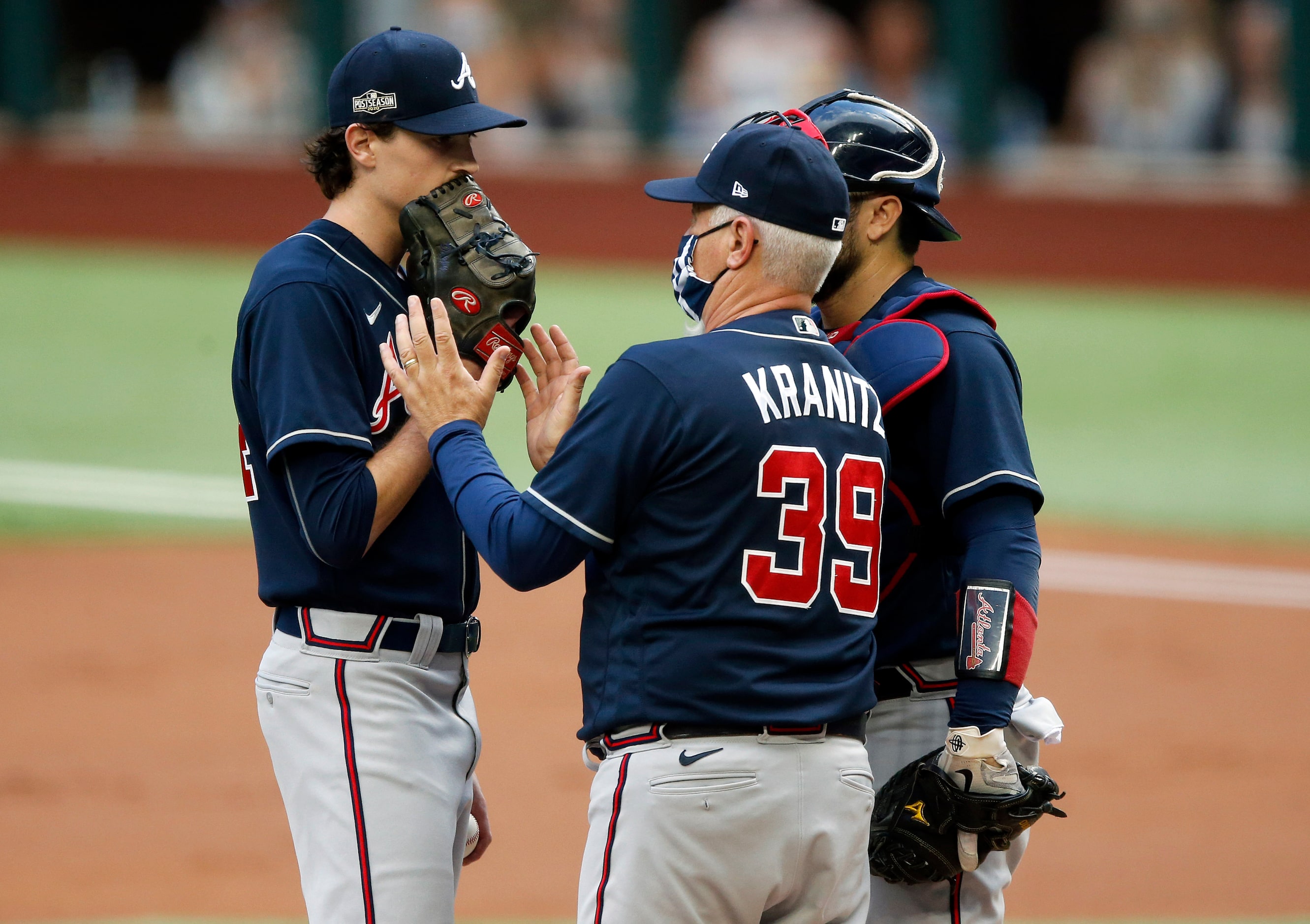 Atlanta Braves pitching coach Rick Kranitz settles down Atlanta Braves starting pitcher Max...