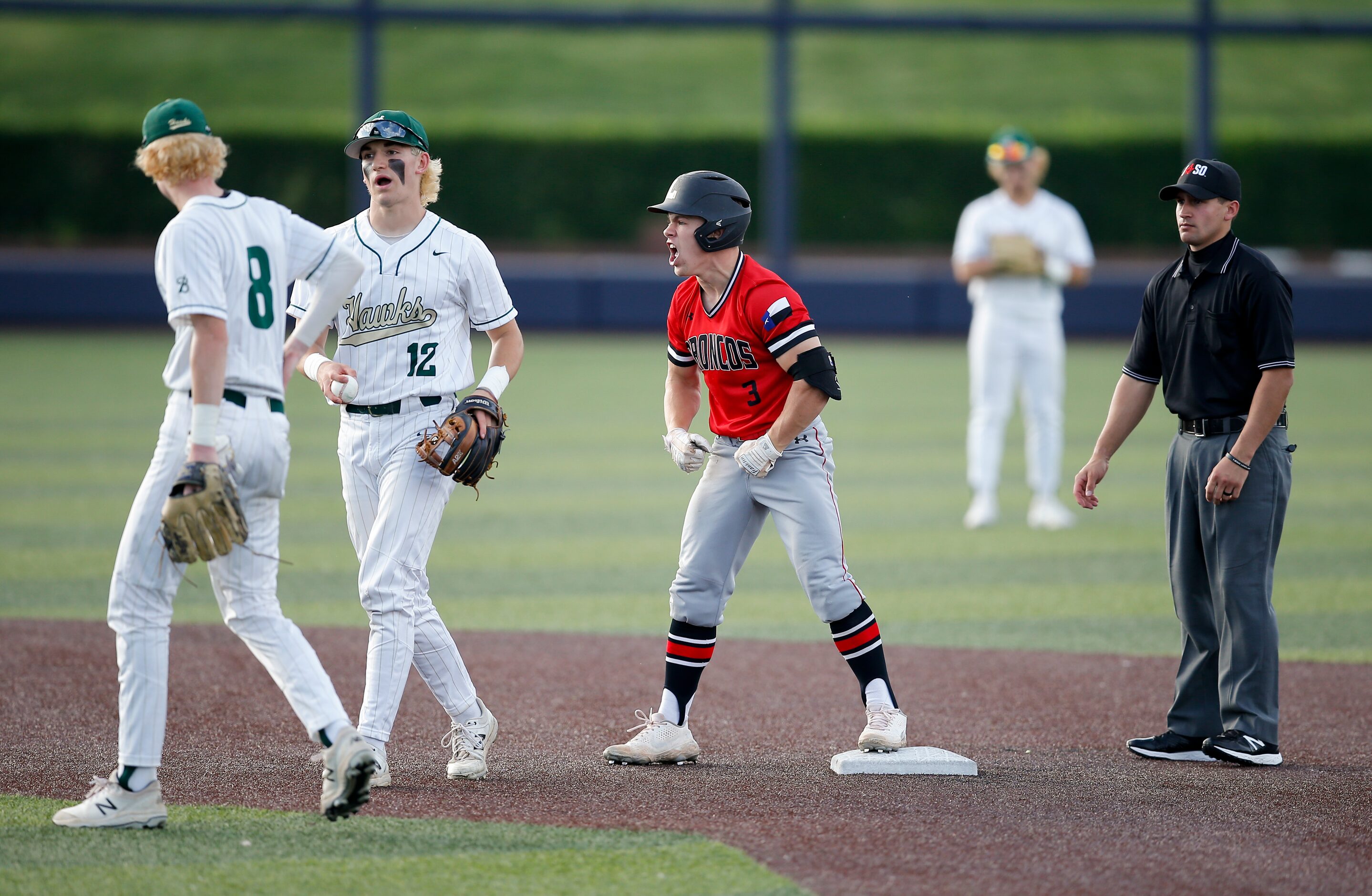 Mansfield Legacy’s Easton Steenbakkers (3) celebrates reaching second as Birdville’s Alex...