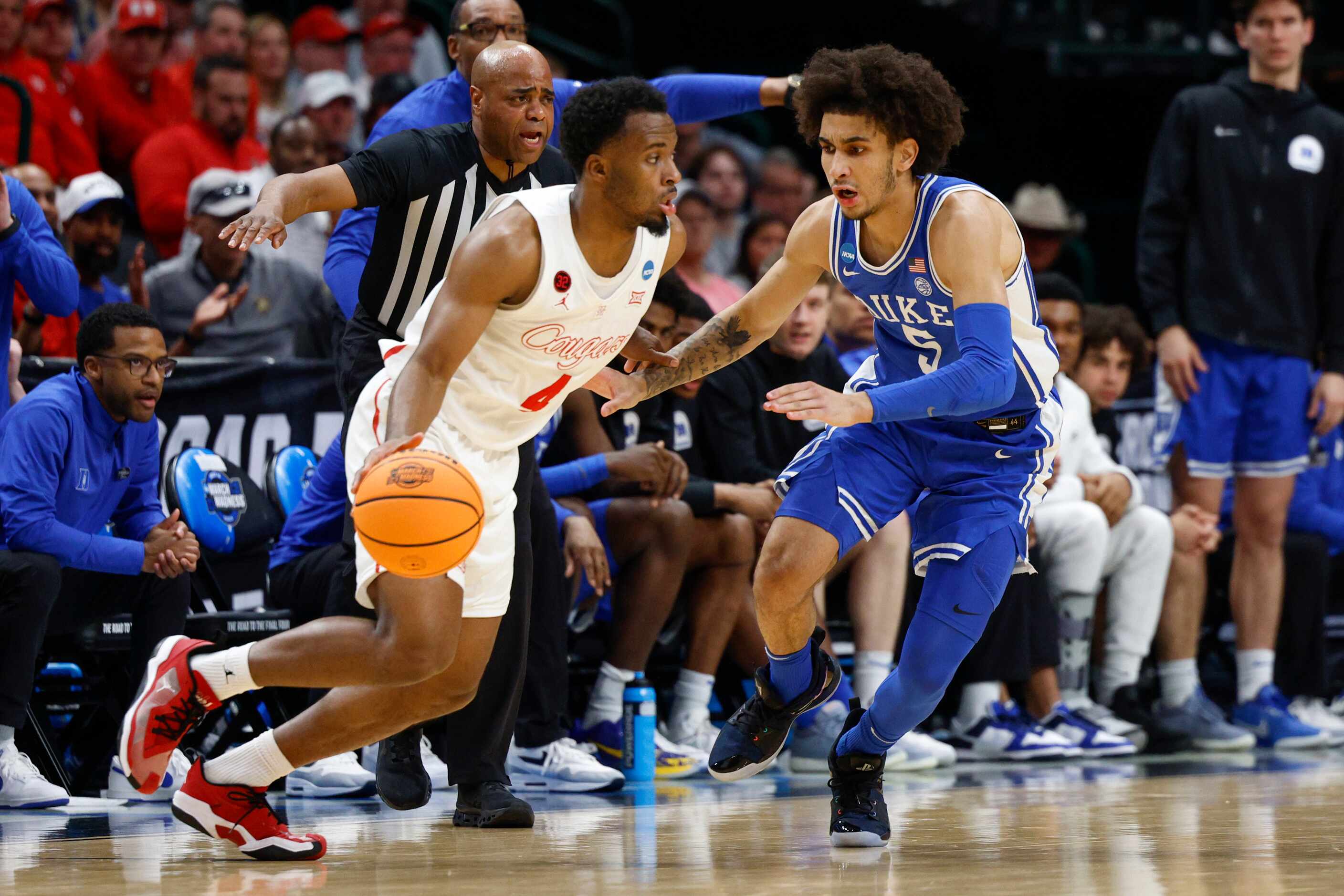 Duke guard Tyrese Proctor (5) defends Houston guard L.J. Cryer (4) during the first half of...