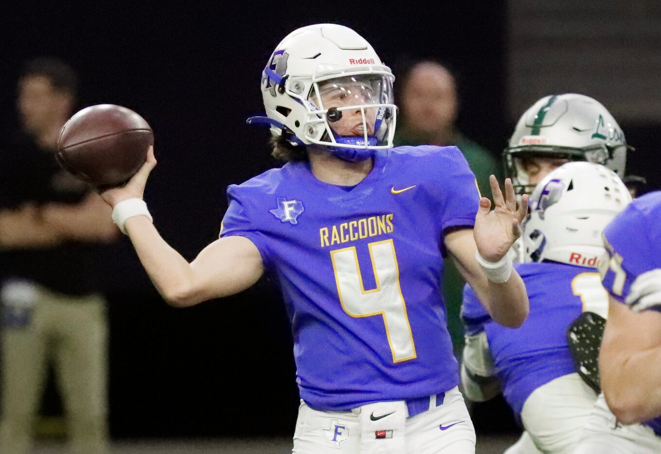 Frisco High School Camren Gibson (4) throws a pass during the first half as Reedy High...