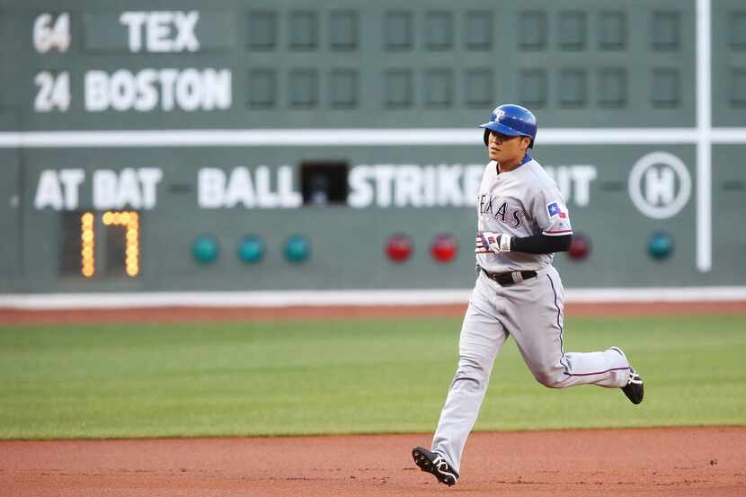 BOSTON, MA - JULY 05:  Shin Soo Choo #15 of the Texas Rangers rounds the bases after hitting...