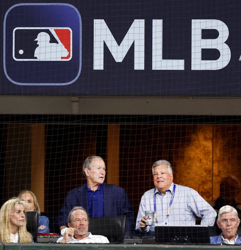 Creed band members at ALCS Game 3 in Texas Rangers gear