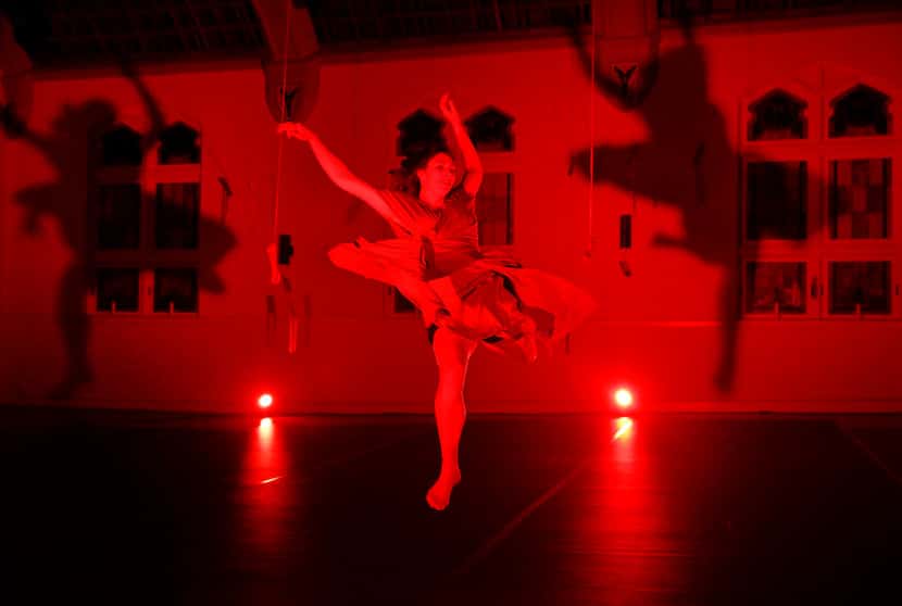 Artist-teacher-entrepreneur Amy Morrow performs Conversation While Dancing with ballet shoes...