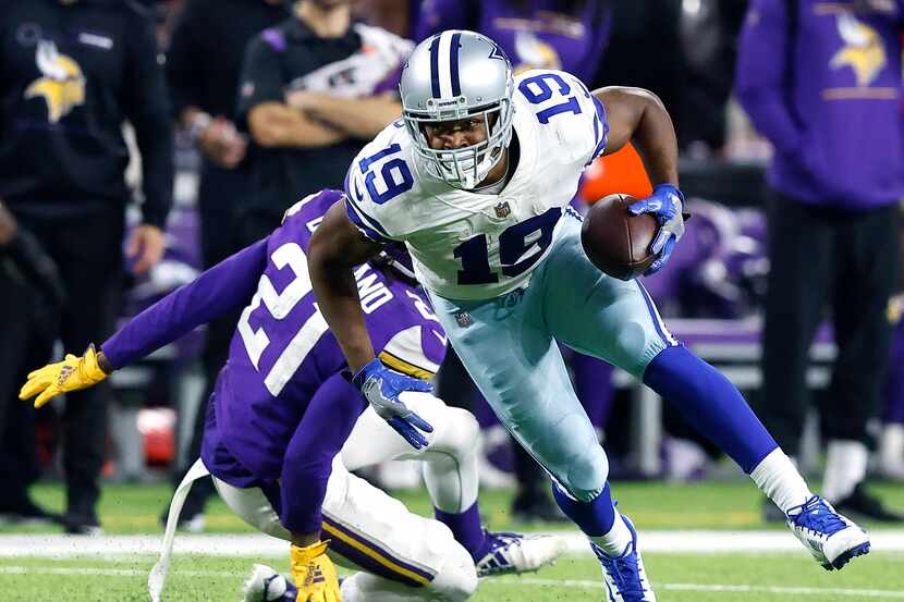 Dallas Cowboys wide receiver Amari Cooper (19) makes a move on Minnesota Vikings cornerback...