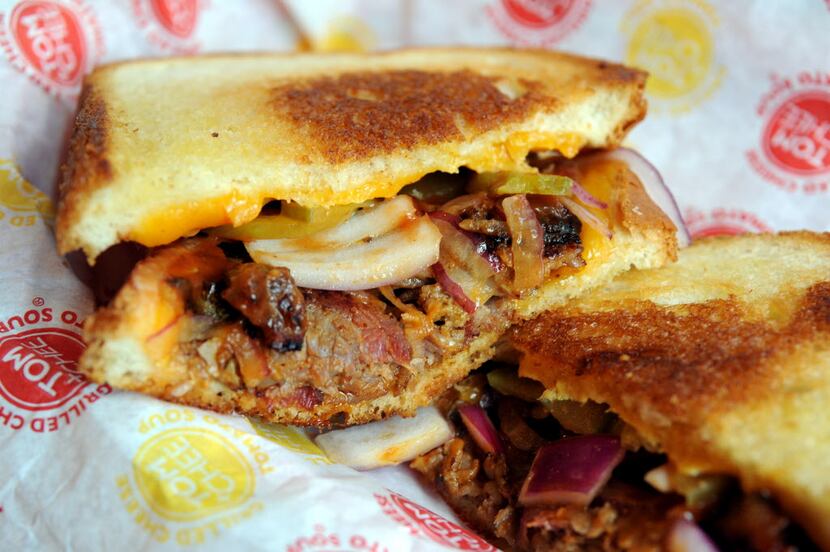 This Texas-only sandwich comes with smoked brisket, red onions, pickles, cheddar cheese and...