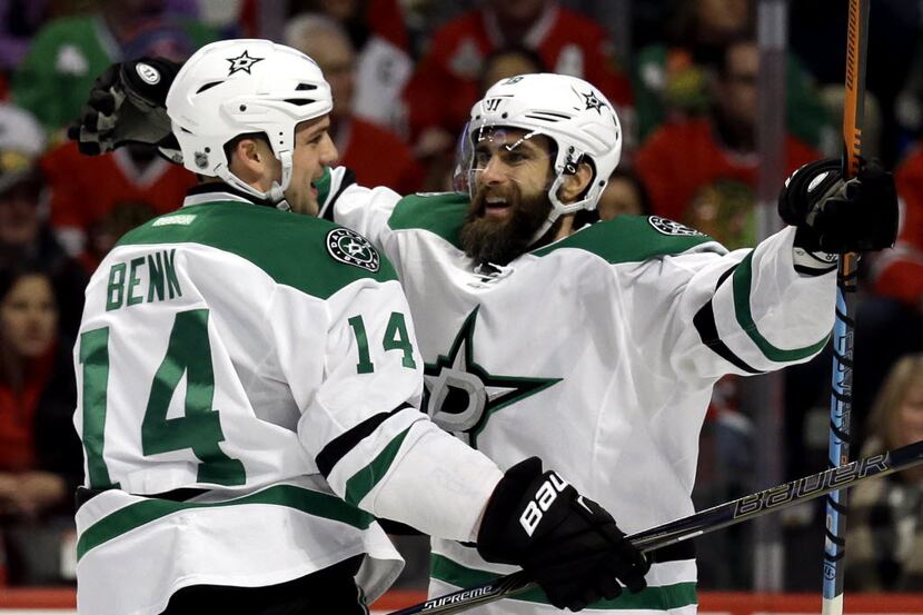 Dallas Stars right wing Patrick Eaves, right, celebrates with left wing Jamie Benn after...