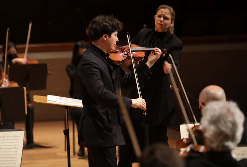 Guest conductor Gemma New and violin soloist Augustin Hadelich.