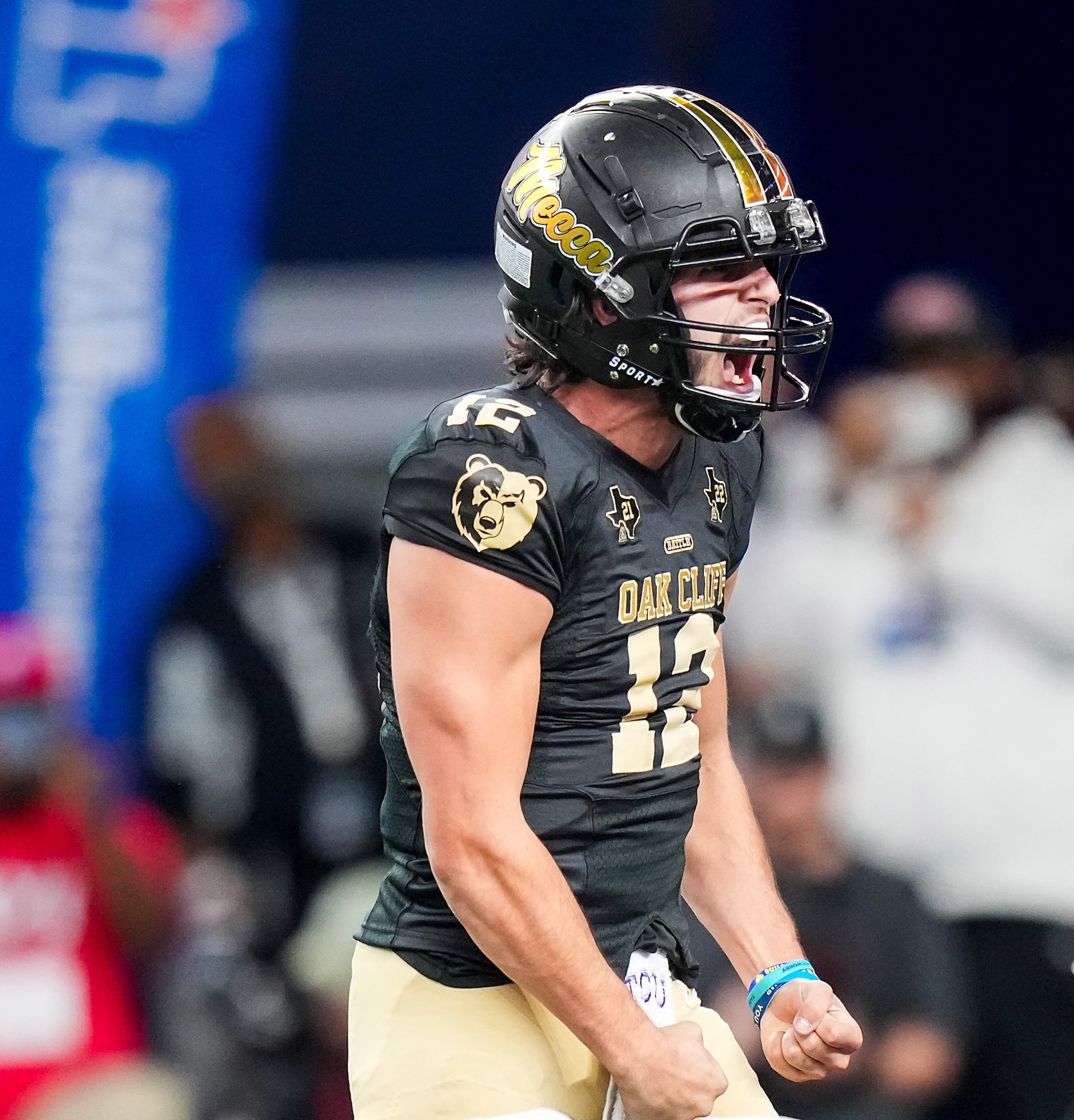 South Oak Cliff quarterback Carter Kopecky celebrates after a touchdown by running back...