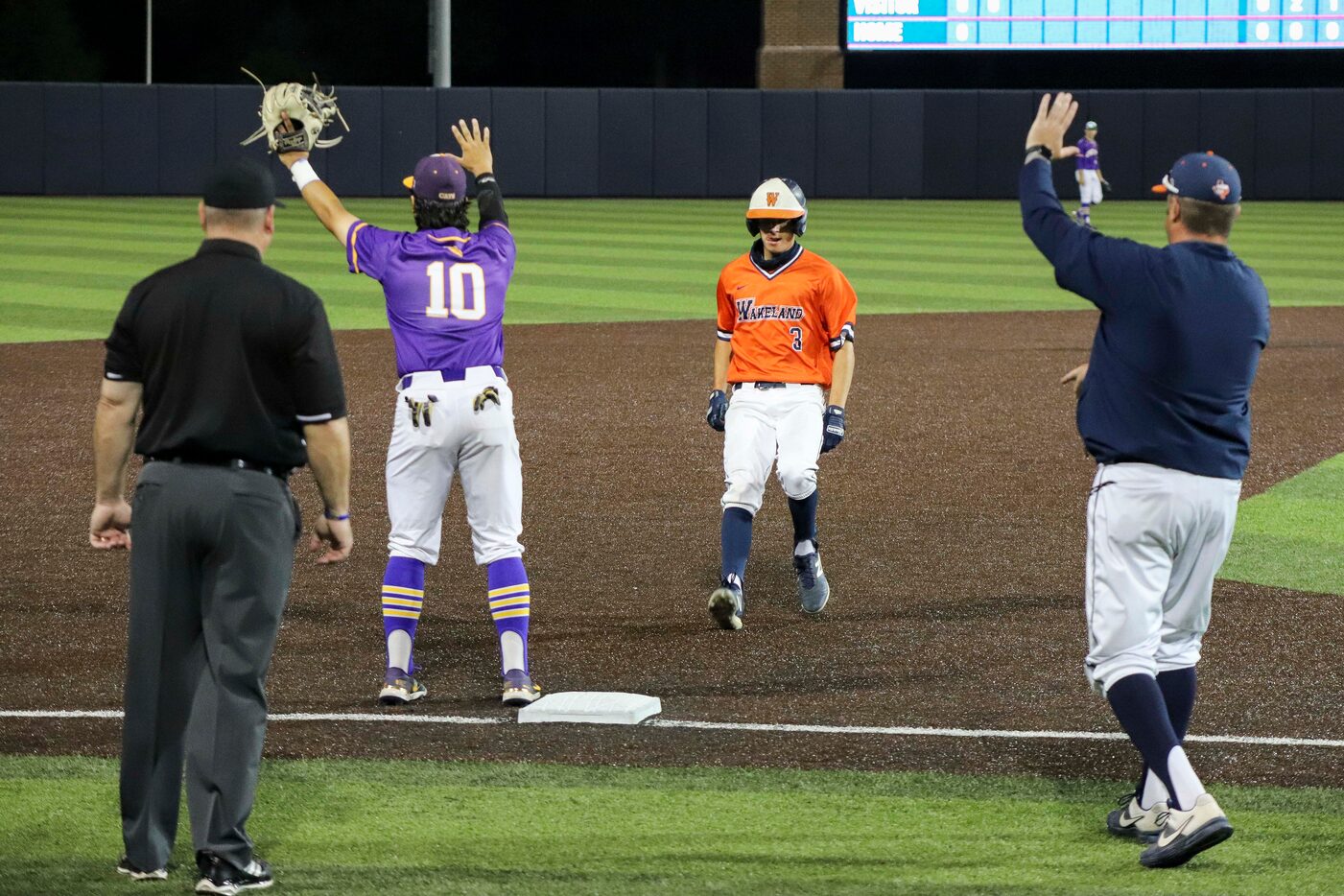 Frisco Wakeland designated hitter Luke Robertson (3) reaches third base after a sacrifice...