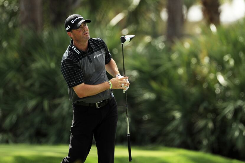 PALM BEACH GARDENS, FL - FEBRUARY 24:  Ryan Palmer of the United States plays his shot from...