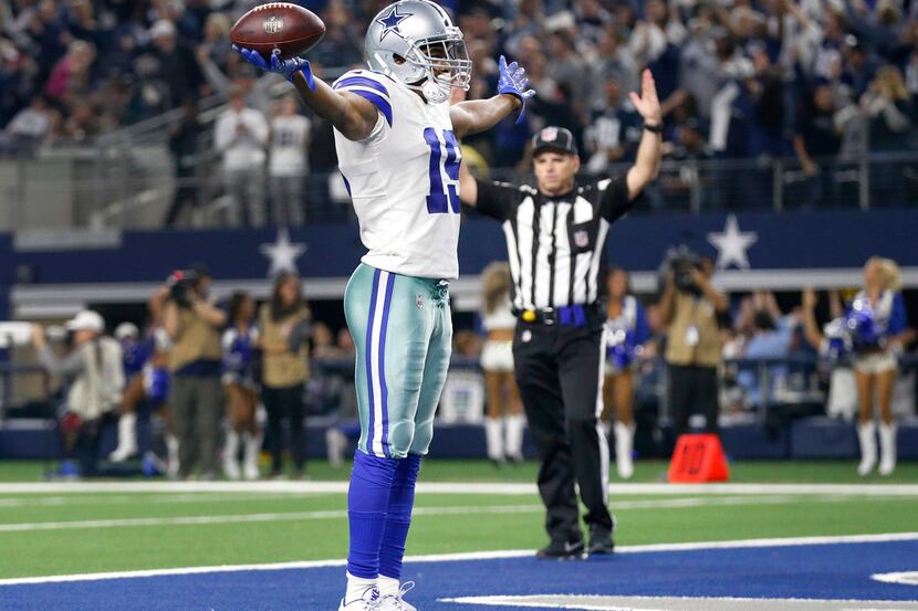 Dallas Cowboys wide receiver Amari Cooper (19) celebrates a touchdown after a long fourth...