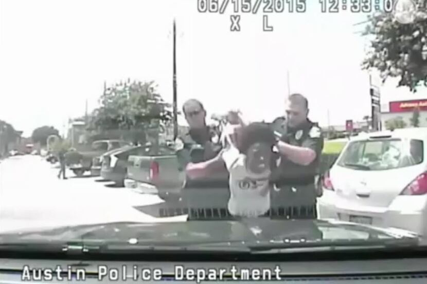 Breaion King is restrained by officers during a traffic stop in Austin.