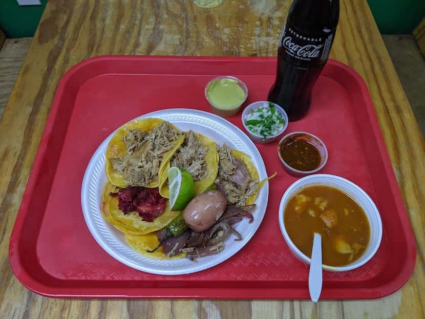 A simple taco plate at Carnitas La Cotorra may not look like much, but these are ideal...