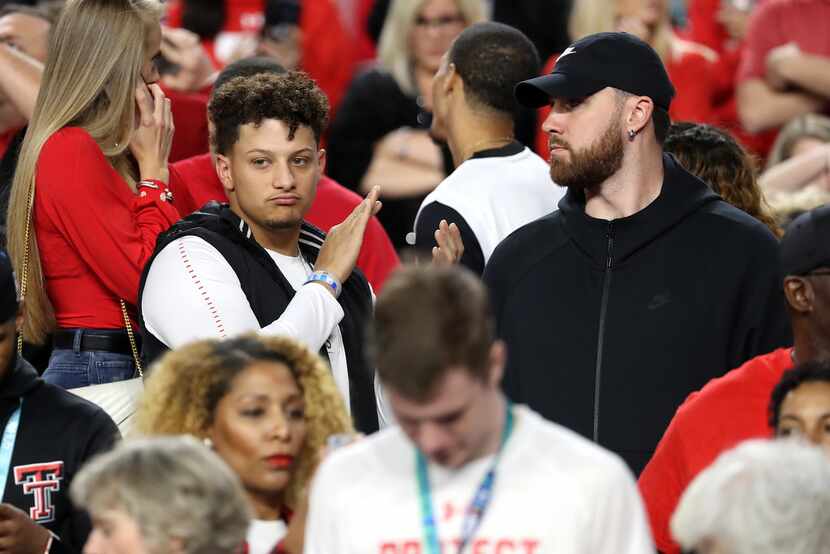 MINNEAPOLIS, MINNESOTA - APRIL 08:  NFL players Patrick Mahomes and Travis Kelce looks on...