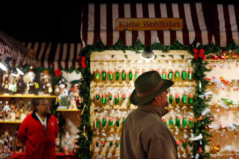 Charles Restivo of Grapevine views some of the many Christmas ornaments at the Kathe...