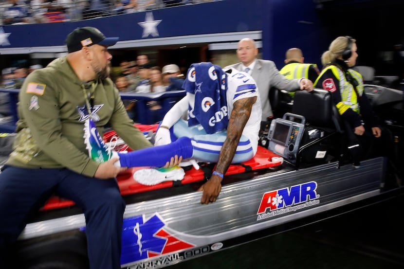 Dallas Cowboys cornerback Anthony Brown (3) is carted off the field after sustaining a third...