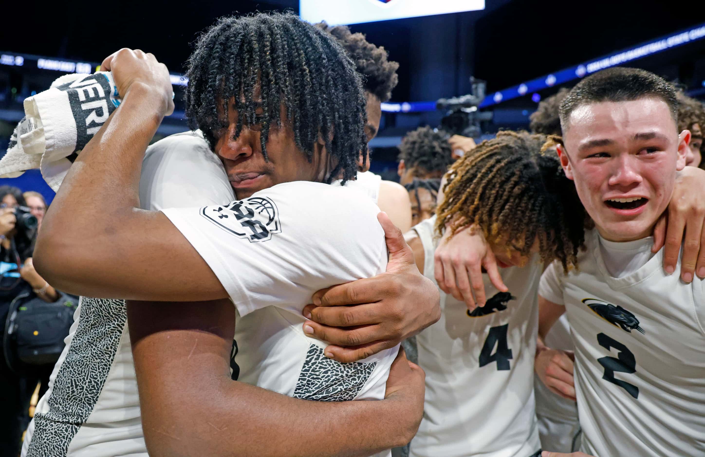 Plano East players celebrate after defeating Round Rock Stony Point 53-41 in the UIL Class...