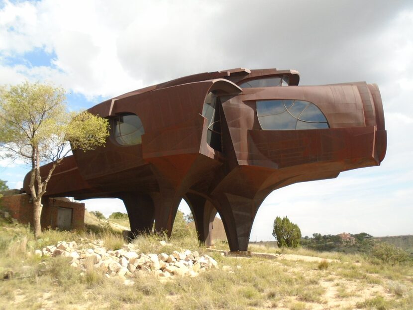 The Robert Bruno Steel House is literally a work of art perched over a lake in Ransom Canyon...