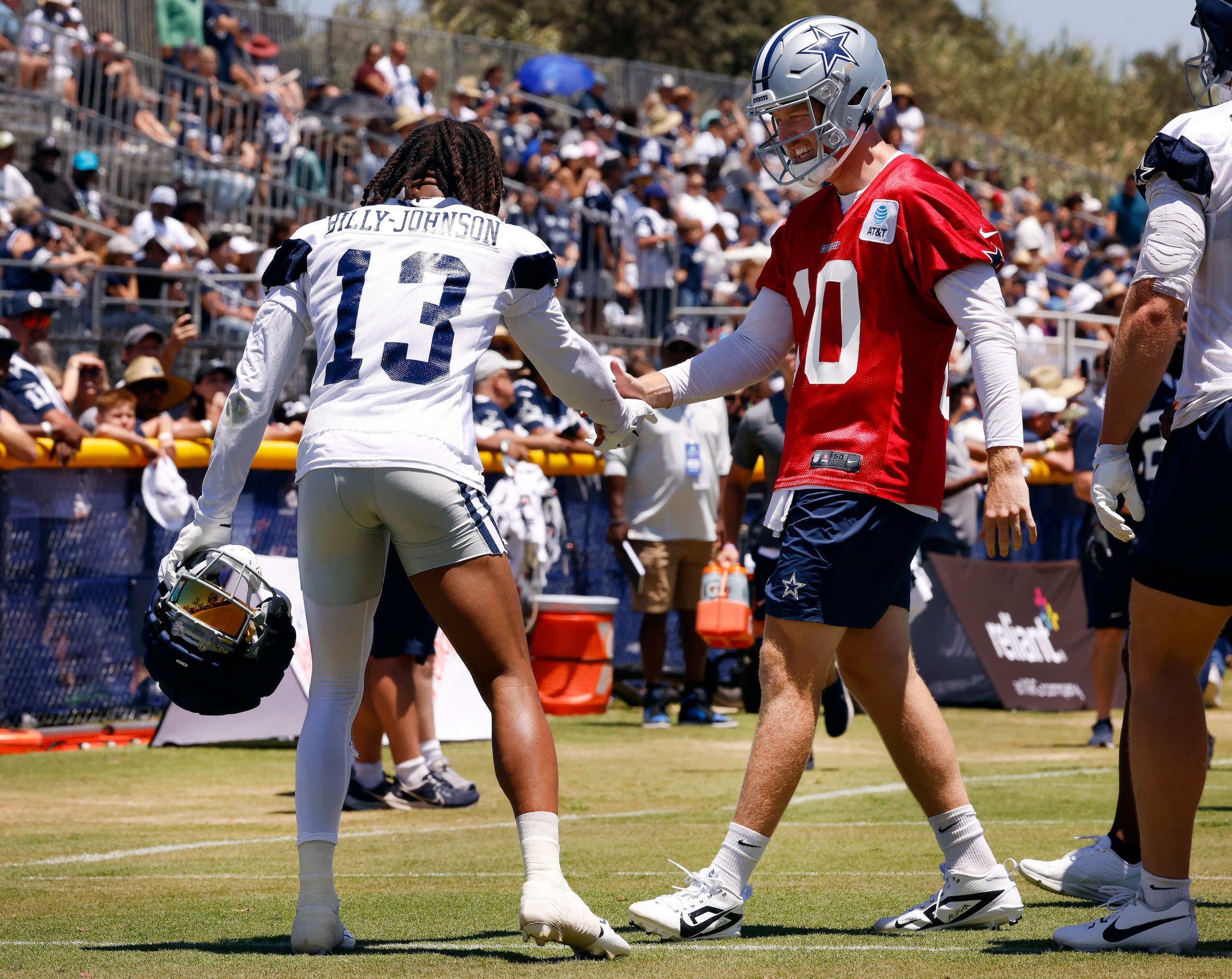 Dallas Cowboys wide receiver Tyron Billy-Johnson (13) and quarterback Cooper Rush (10)...