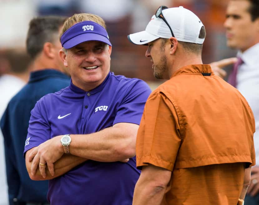 TCU Horned Frogs head coach Gary Patterson greets Texas Longhorns head coach Tom Herman...