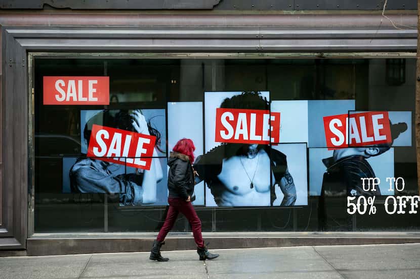 A pedestrian walks past a Diesel S.p.A., store in New York, U.S., on Monday, Jan. 6, 2014....