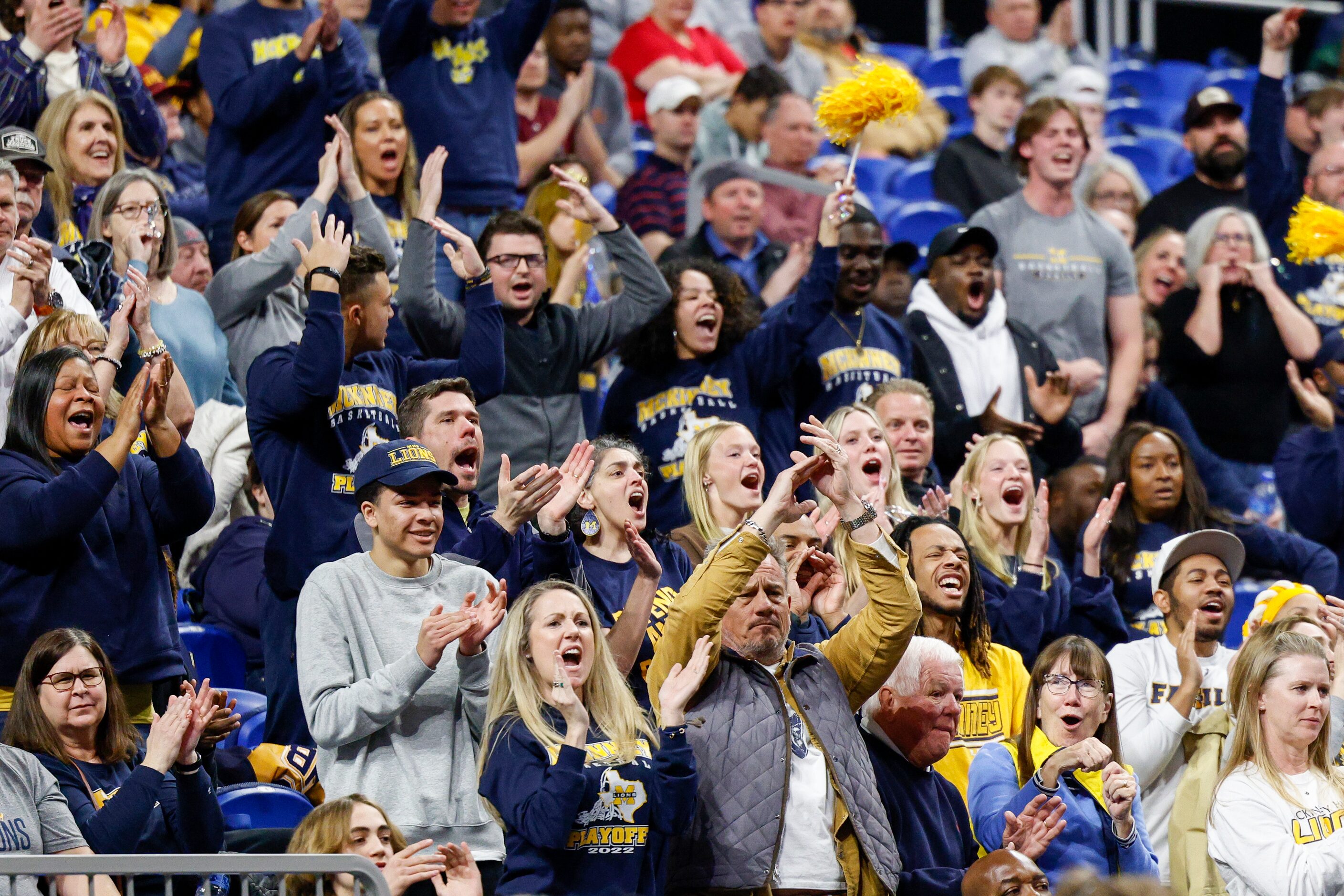 McKinney fans cheer during the first quarter of a Class 6A state semifinal game against...