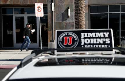 Tyler Schwecke makes a delivery for Jimmy John's. The company has long advertised its...