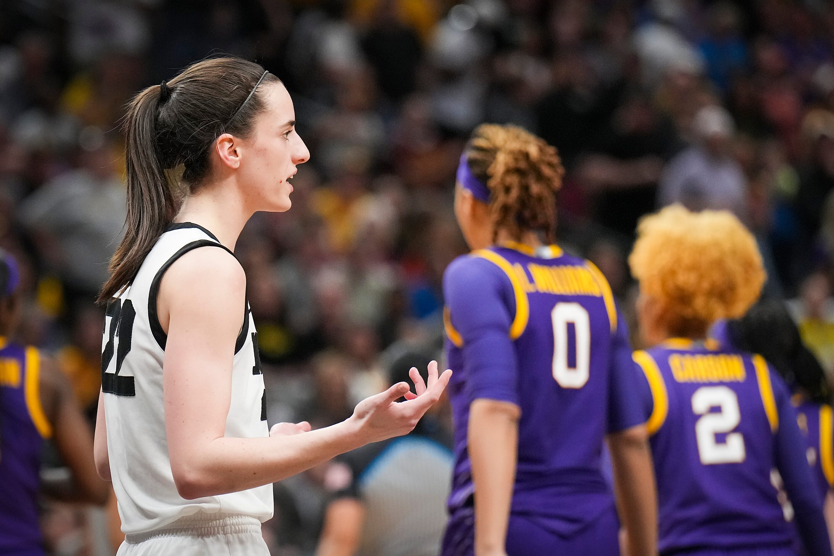 Iowa guard Caitlin Clark (22) reacts after being assessed a technical foul during the second...